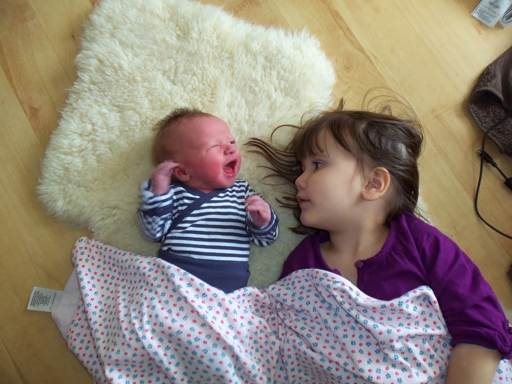 Big Sis and newborn Lil Sis