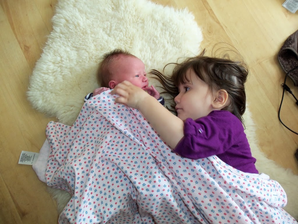 Big Sis and newborn Lil Sis