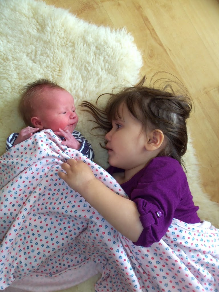 Big Sis and newborn Lil Sis