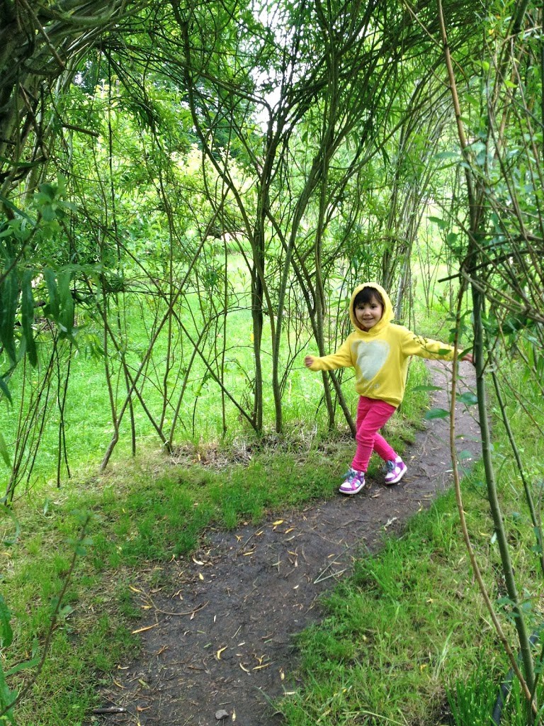 brightly coloured kids' clothing yellow sweatshirt pink jeans