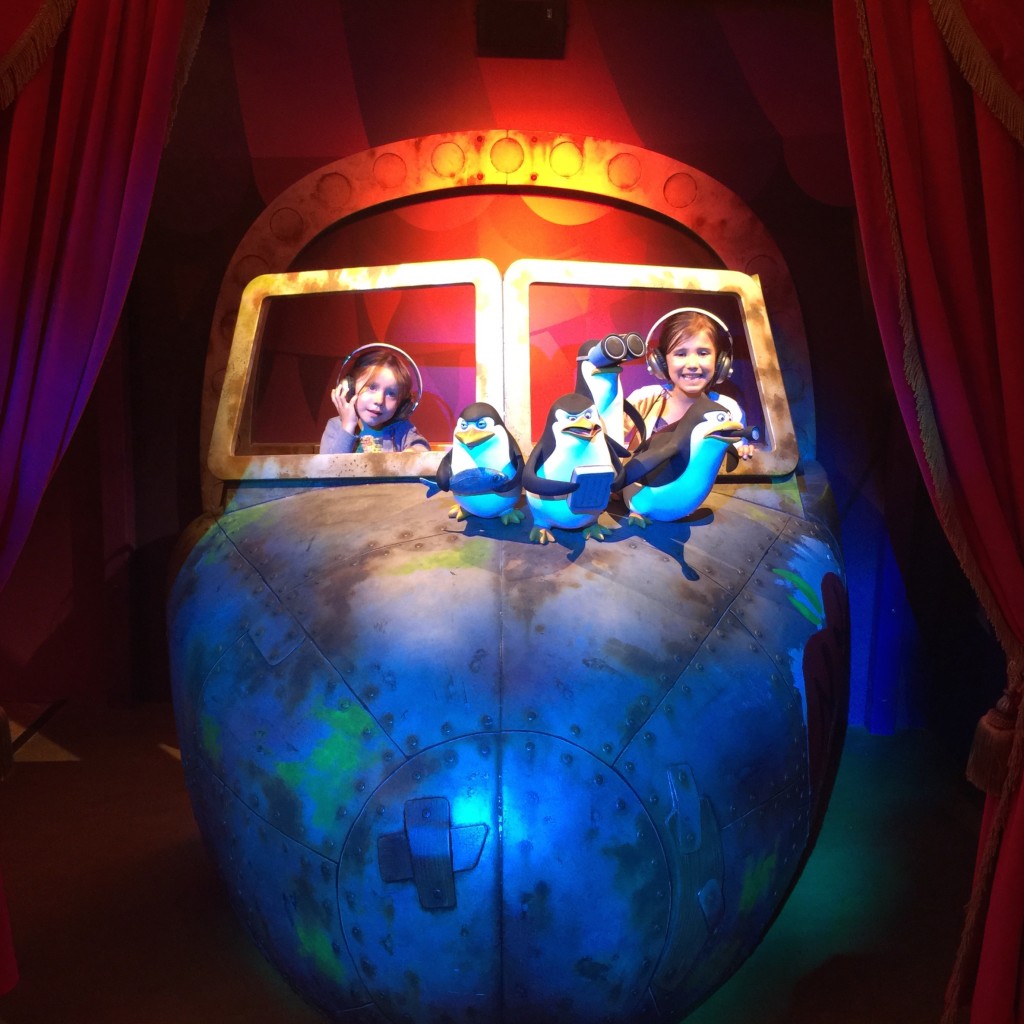 Shrek's Adventure - girls with Madagascar penguins