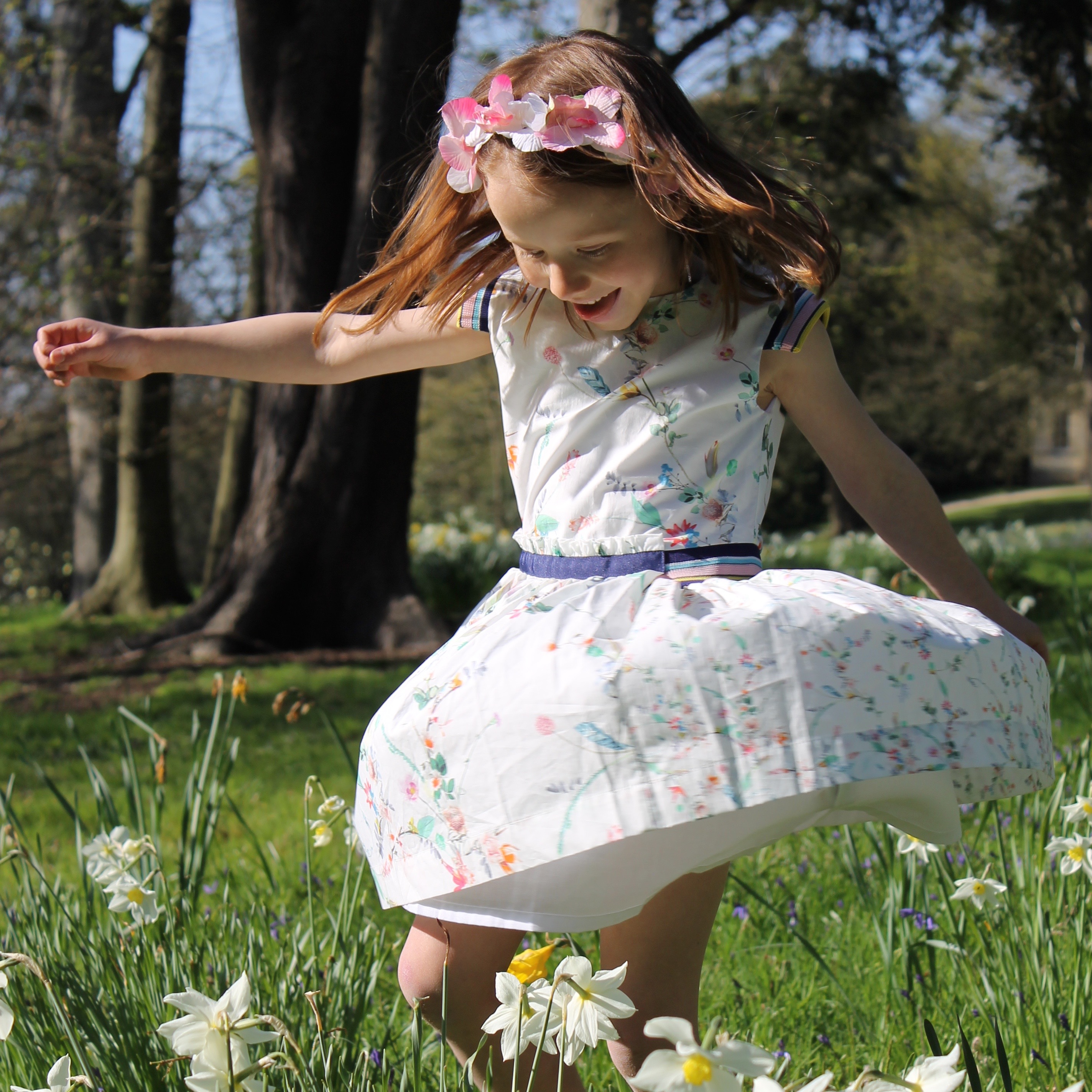 girls' party dresses N twirling