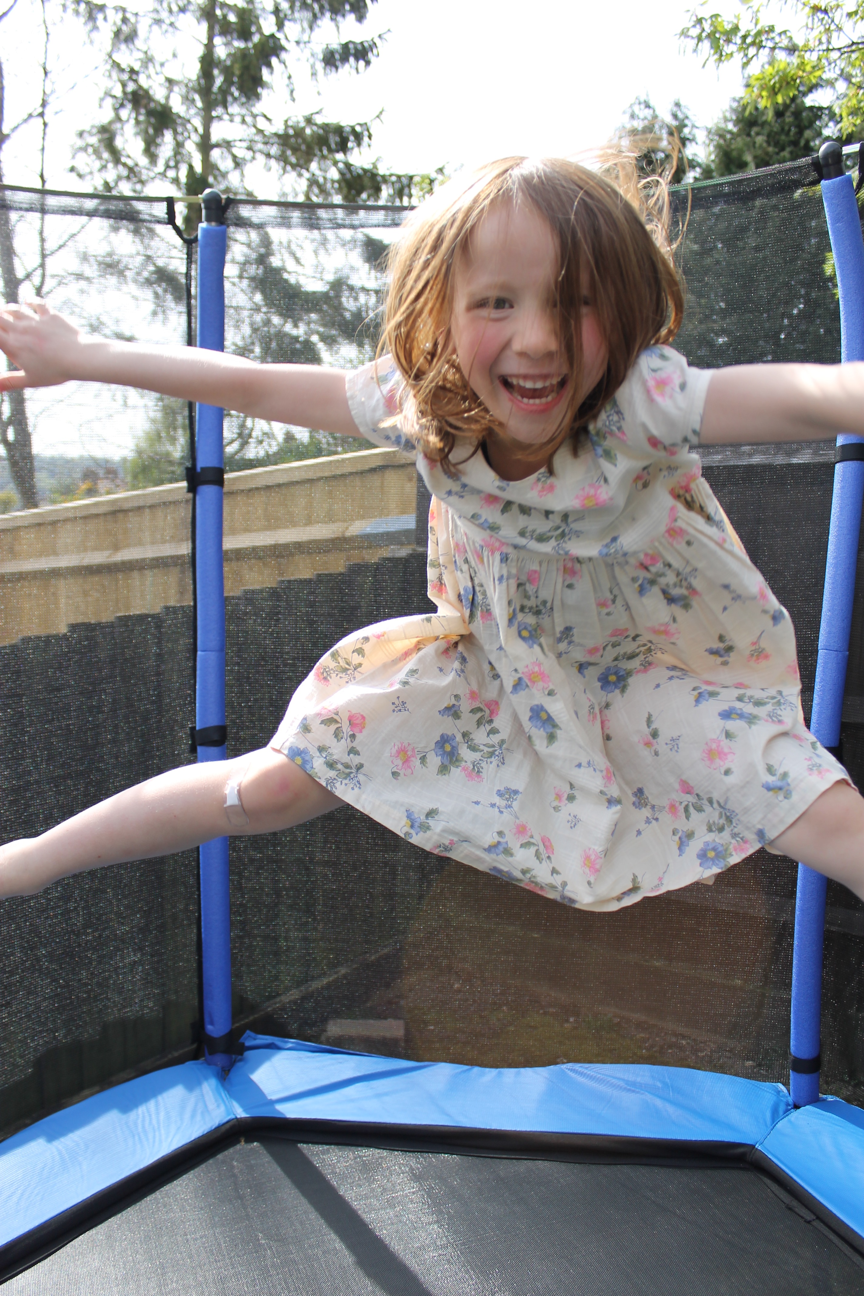 Lil Sis bouncing on Kids' trampoline