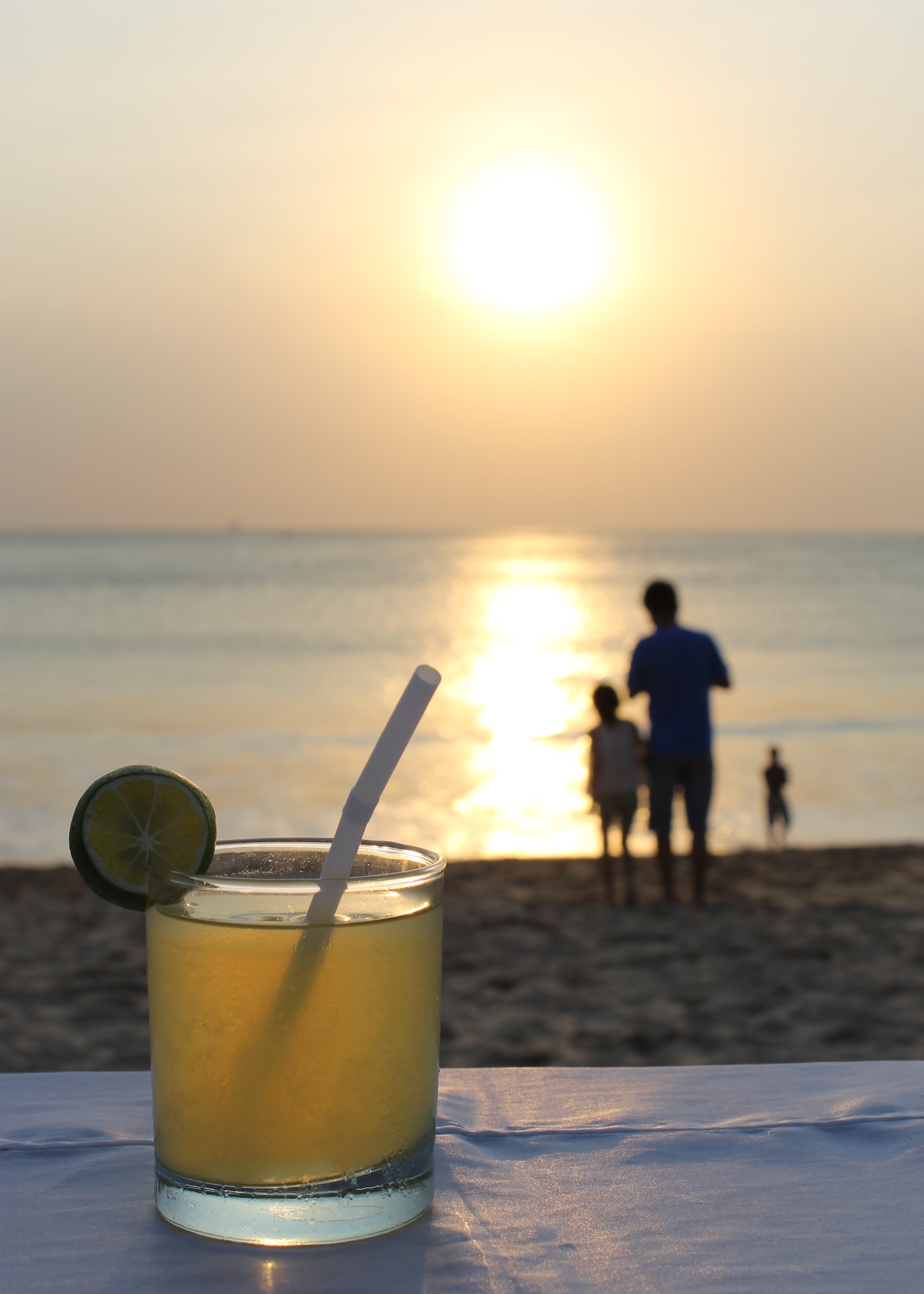 Bali family holidays Jimbaran beach drink