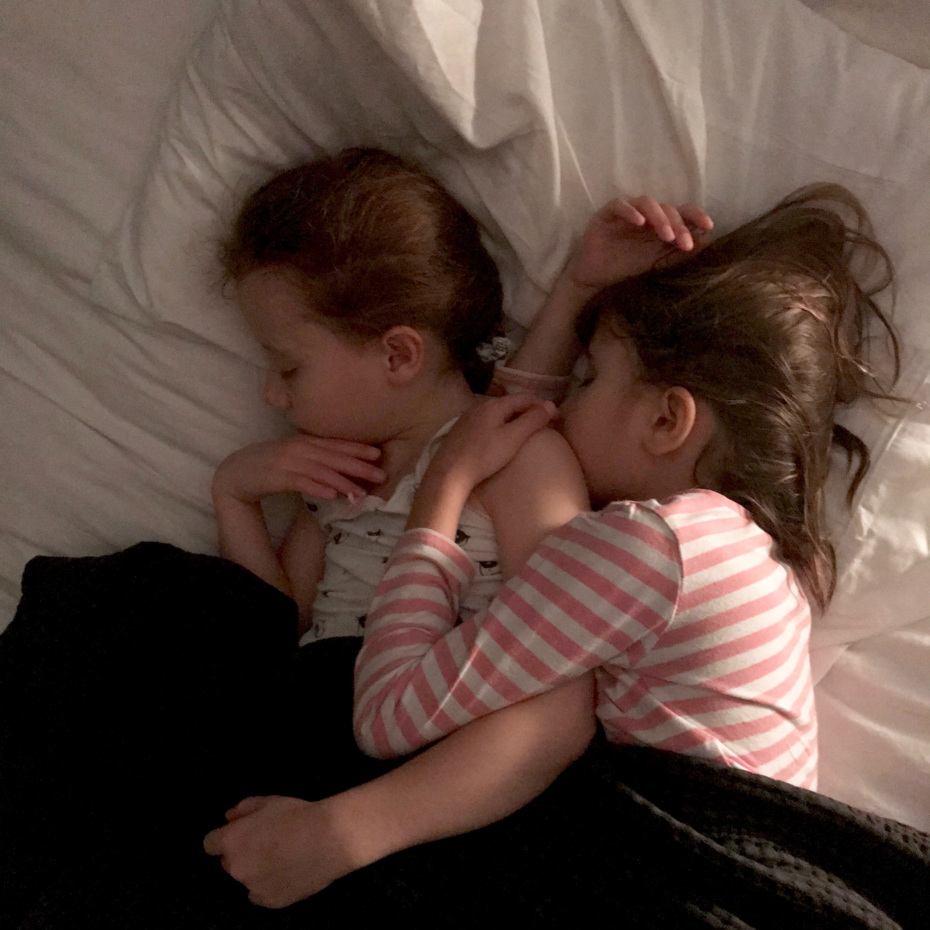 Siblings June sleeping