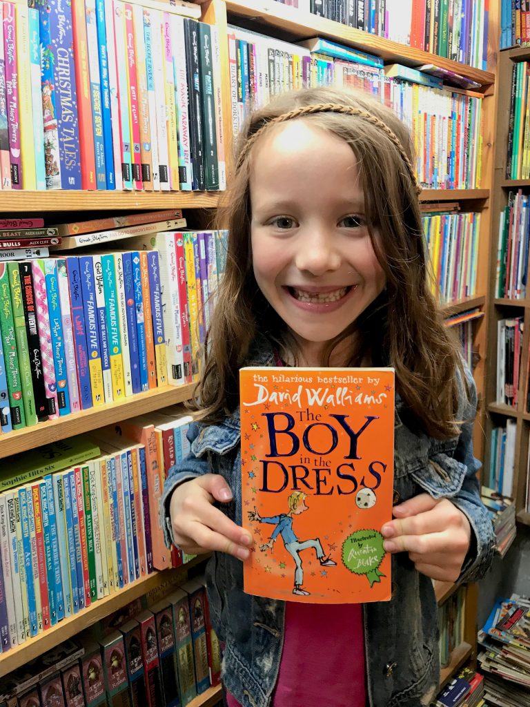 N with her chosen David Walliams book at second-hand bookstore