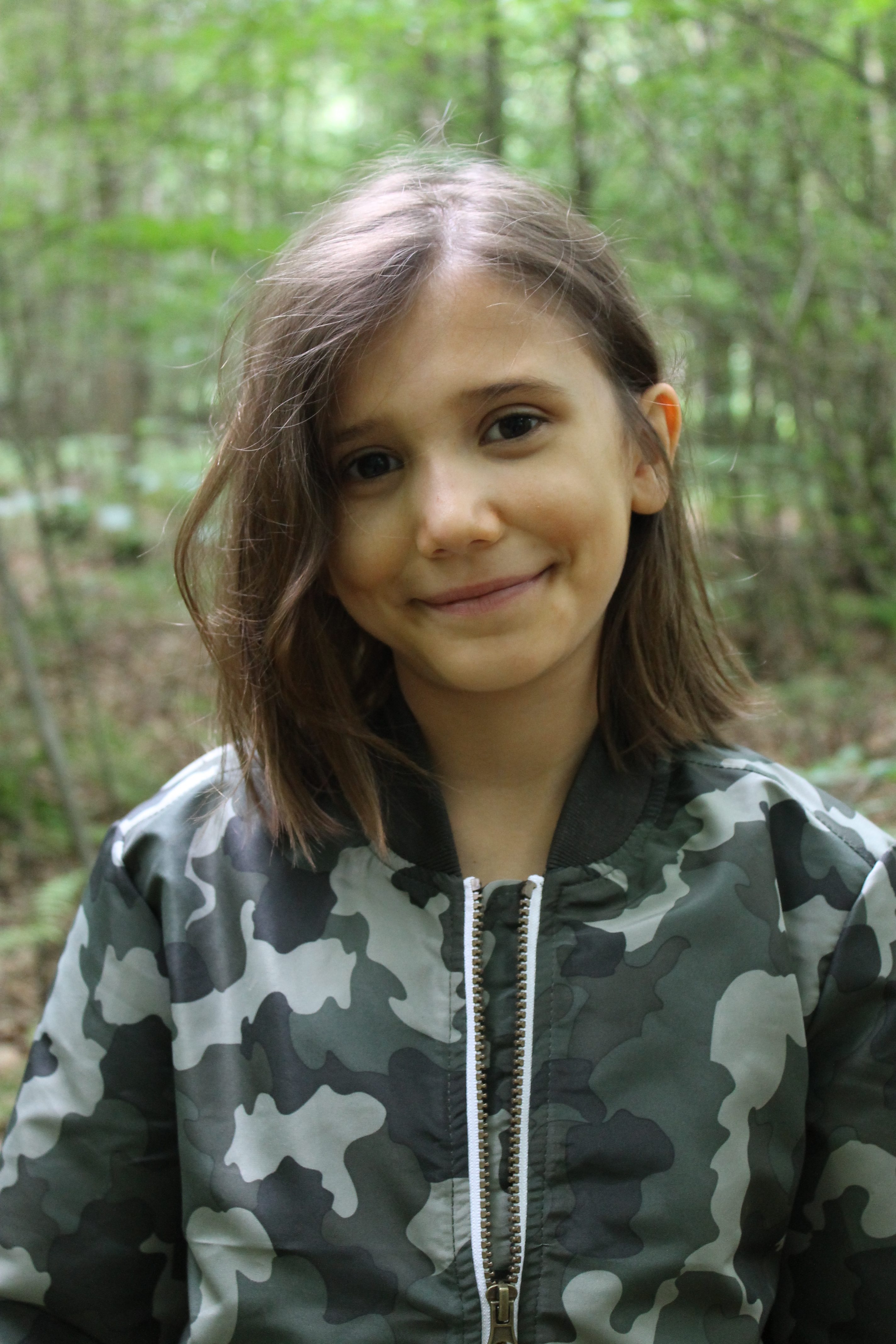 Kids' camouflage bomber jacket close up
