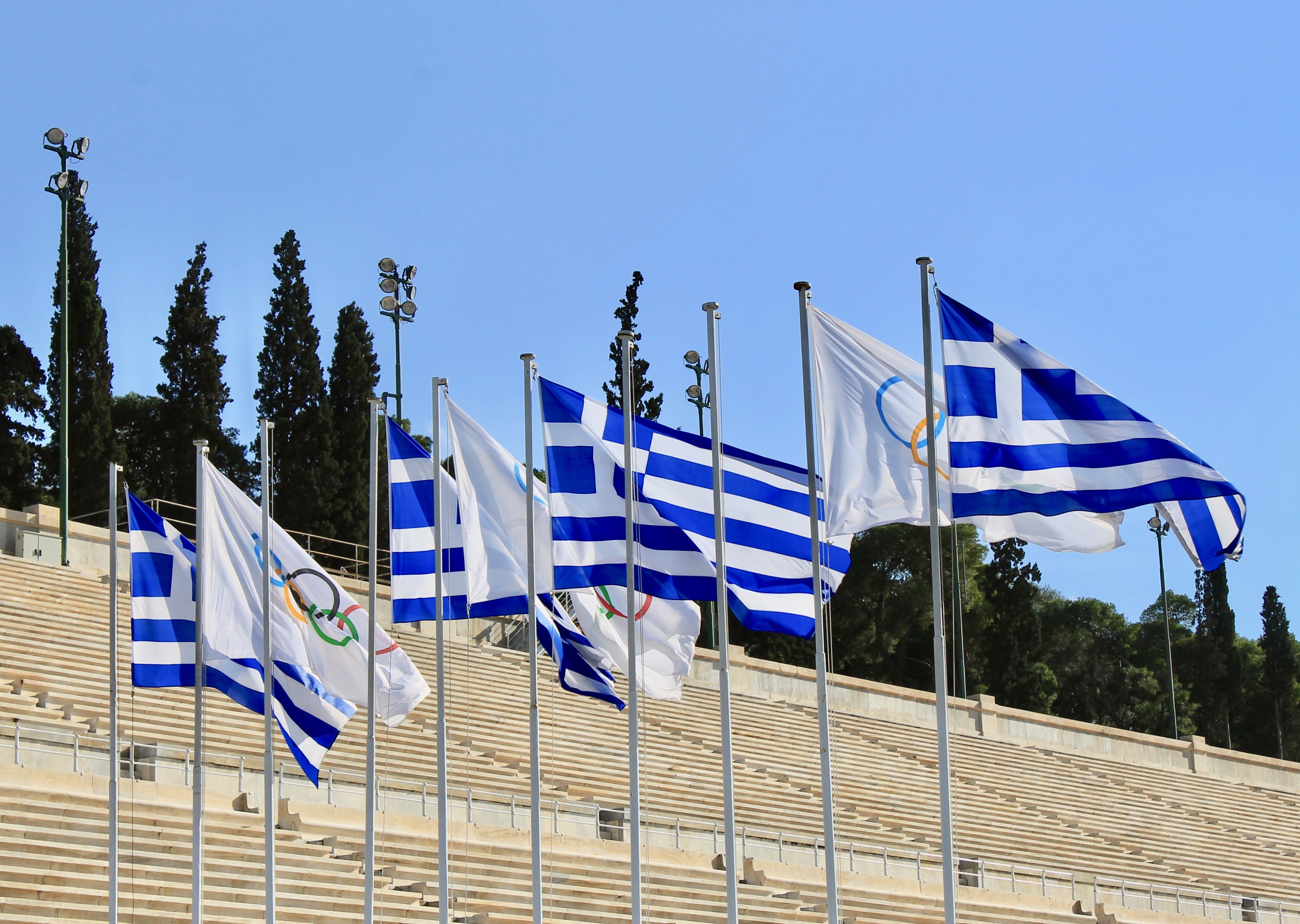 Visiting the Parthenon in Athens Greek flags
