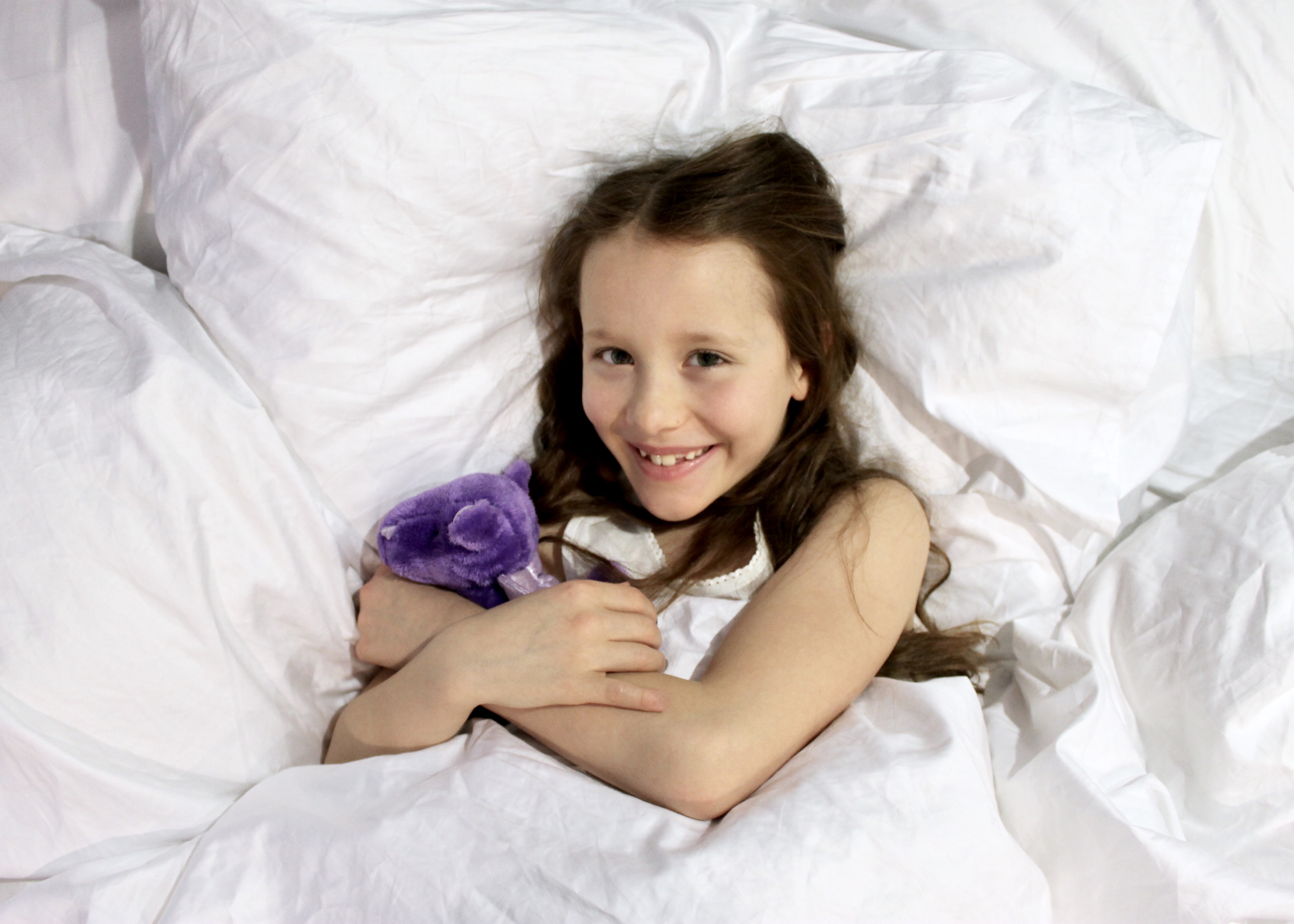 affordable luxury bed linen lil sis snuggled up