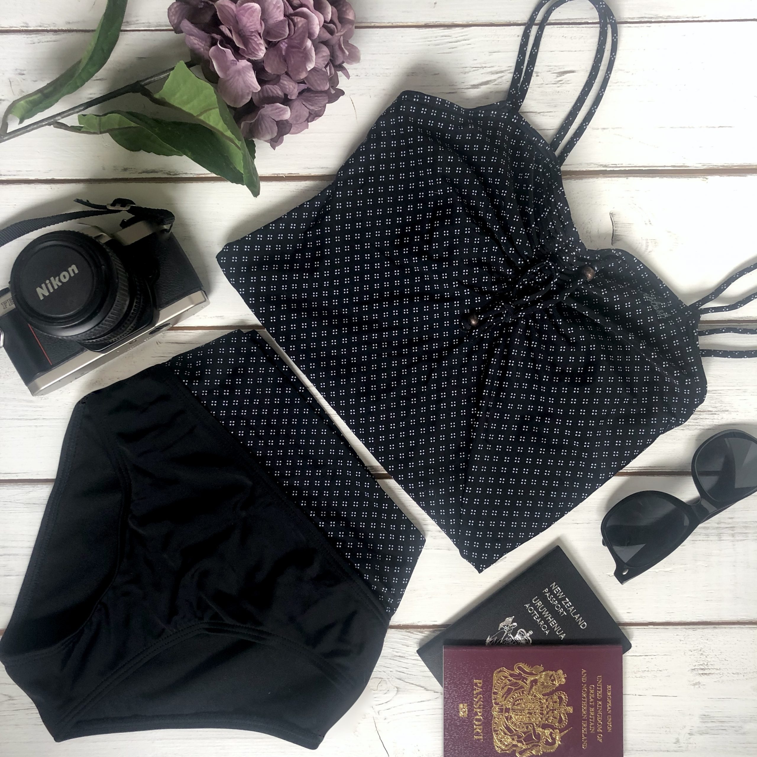 Flattering swimsuits for women over 40 - flat lay