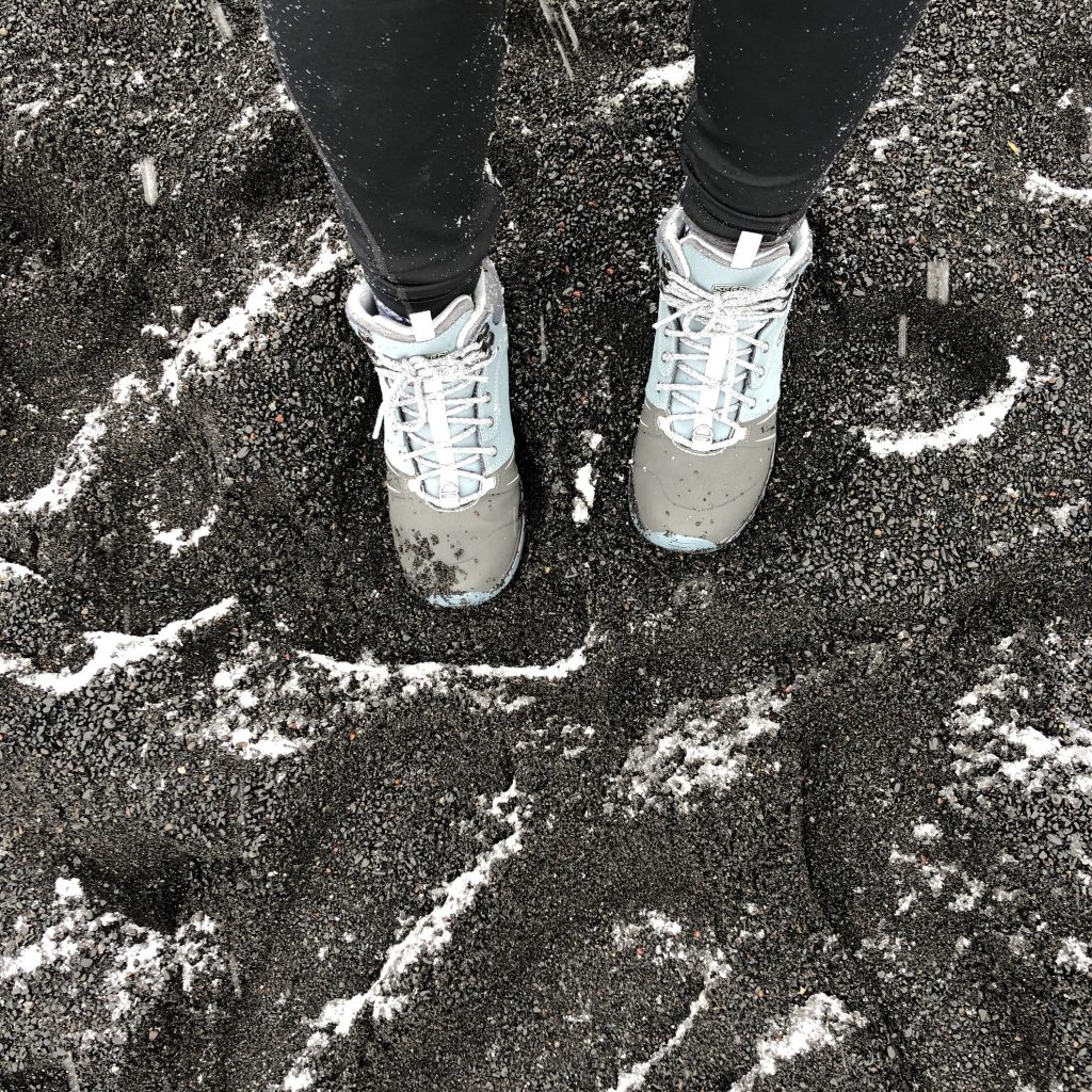 Choosing the right footwear for every terrain - Keen boots on Iceland black sand beach