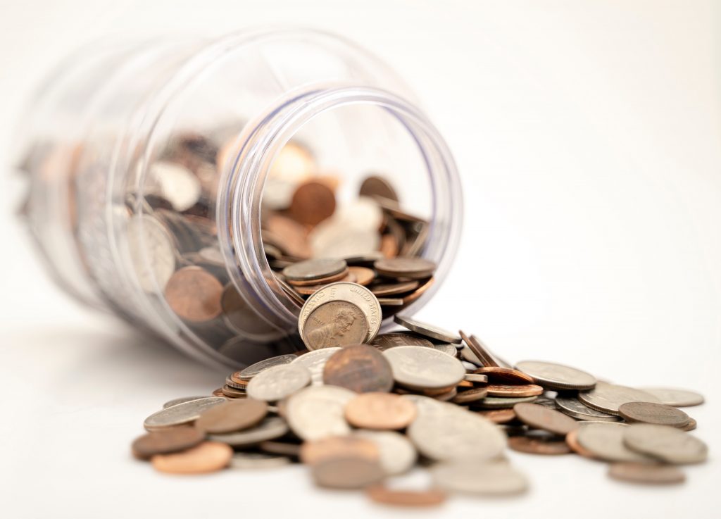 What size mortgage you could get - main shot of money spilling out of a jar